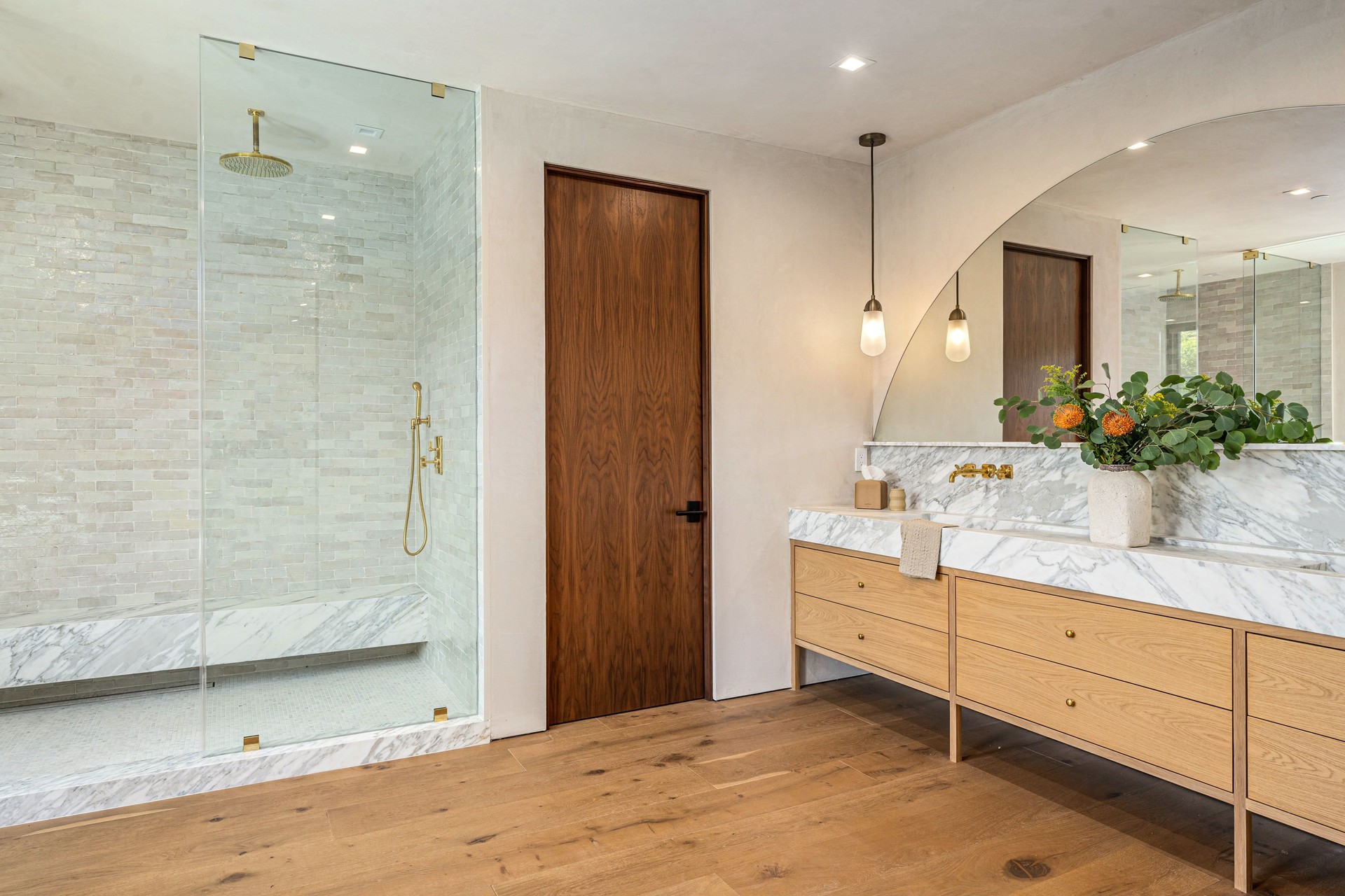 Modern bathroom with marble and wood accents